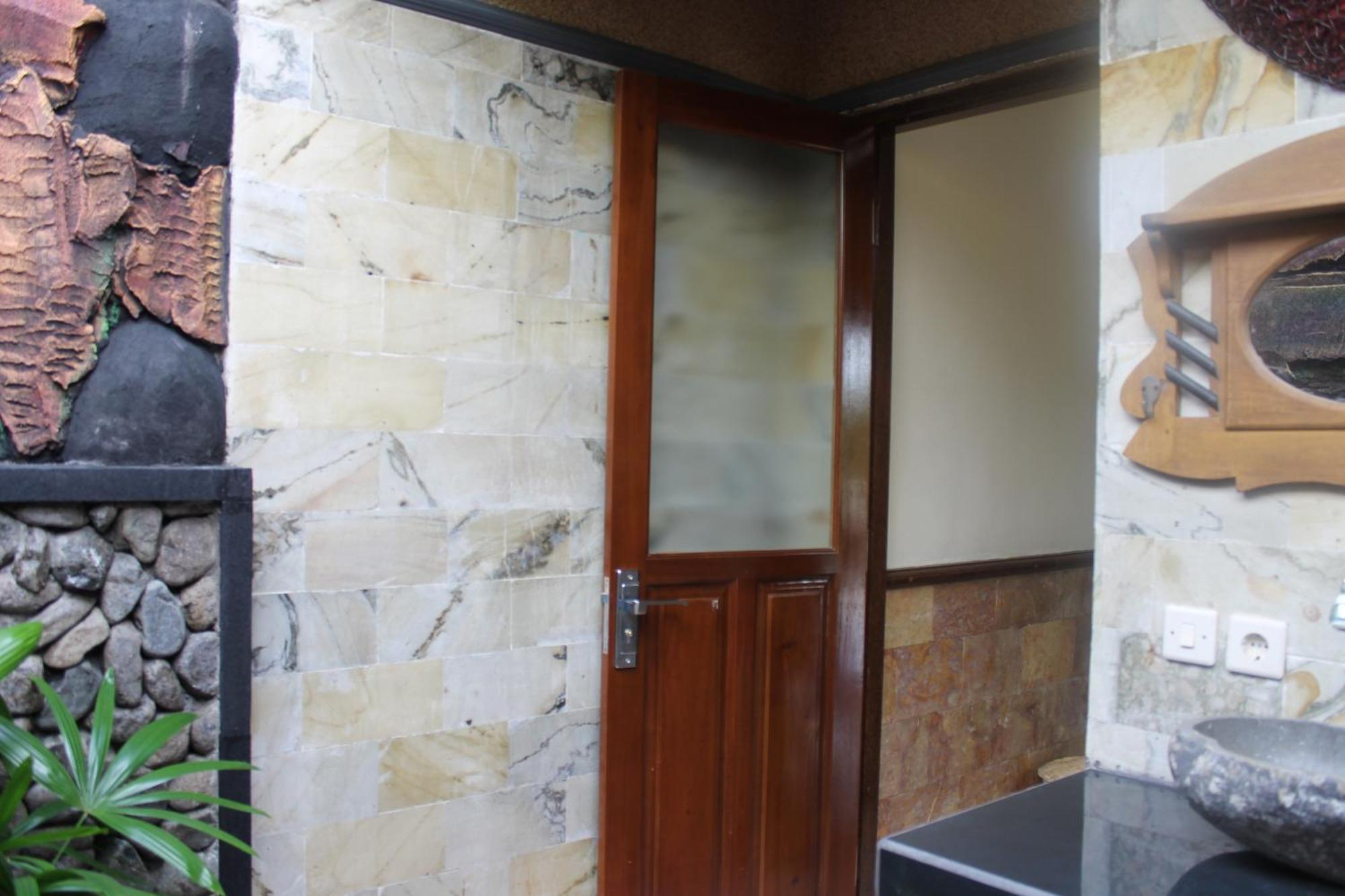 Mans Cottages & Spa Pemuteran Chambre photo